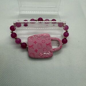 Pink Beaded Bracelet with Designer Charm